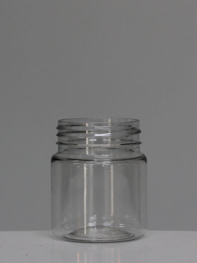 A clear, round, smooth-sided PET Cosmetic jar with a white tamper lid.