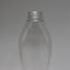 A 500g clear honey squeeze PET bottle with a black cap, designed with a curved shape and structural ribbing.